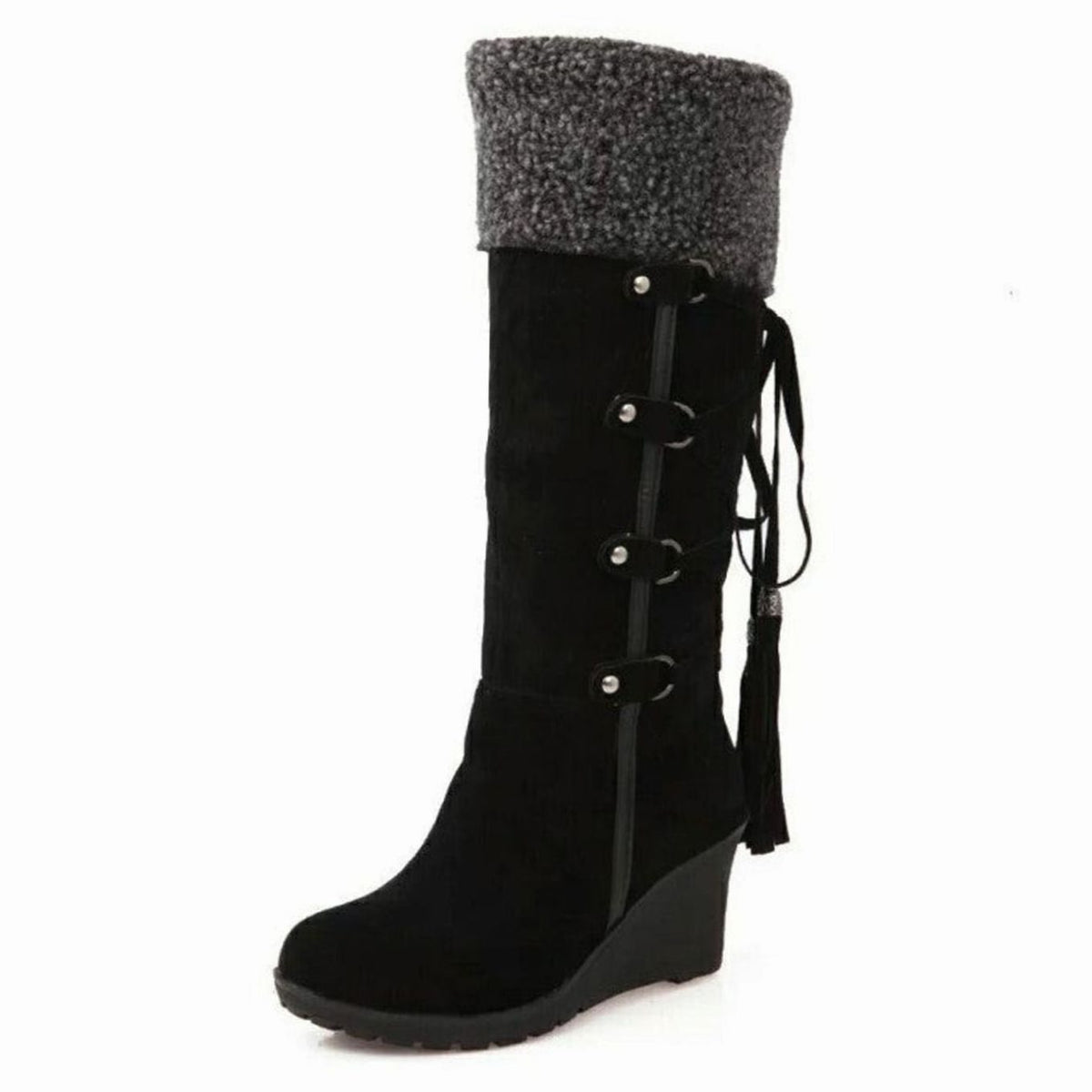 Botas altas hasta la rodilla combinadas con look de invierno para mujer