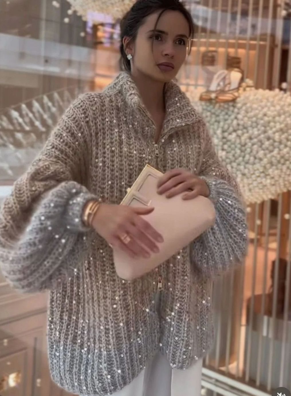 Cárdigan oversize de punto grueso con lentejuelas y cremallera en el cuello