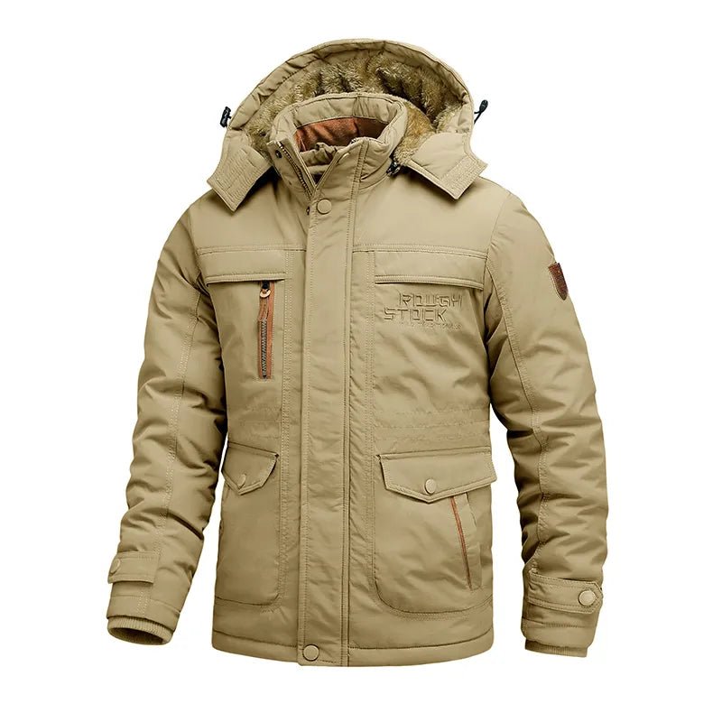 Capucha desmontada de la chaqueta impermeable GRIMSVYK sobre superficie plana