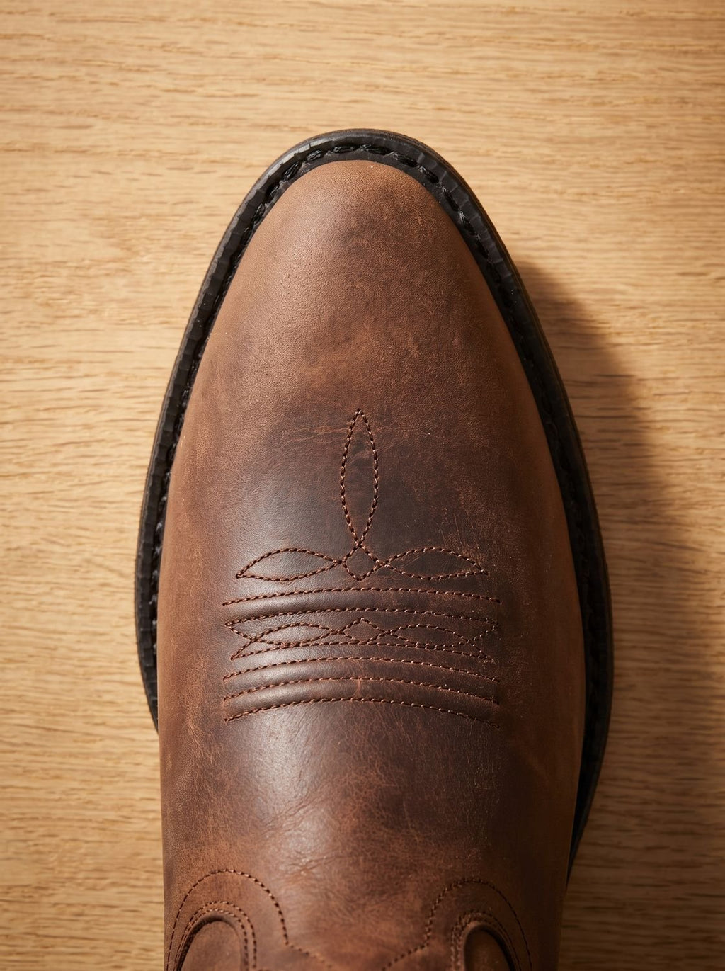 Botas camperas combinadas con vaqueros pitillo, look casual