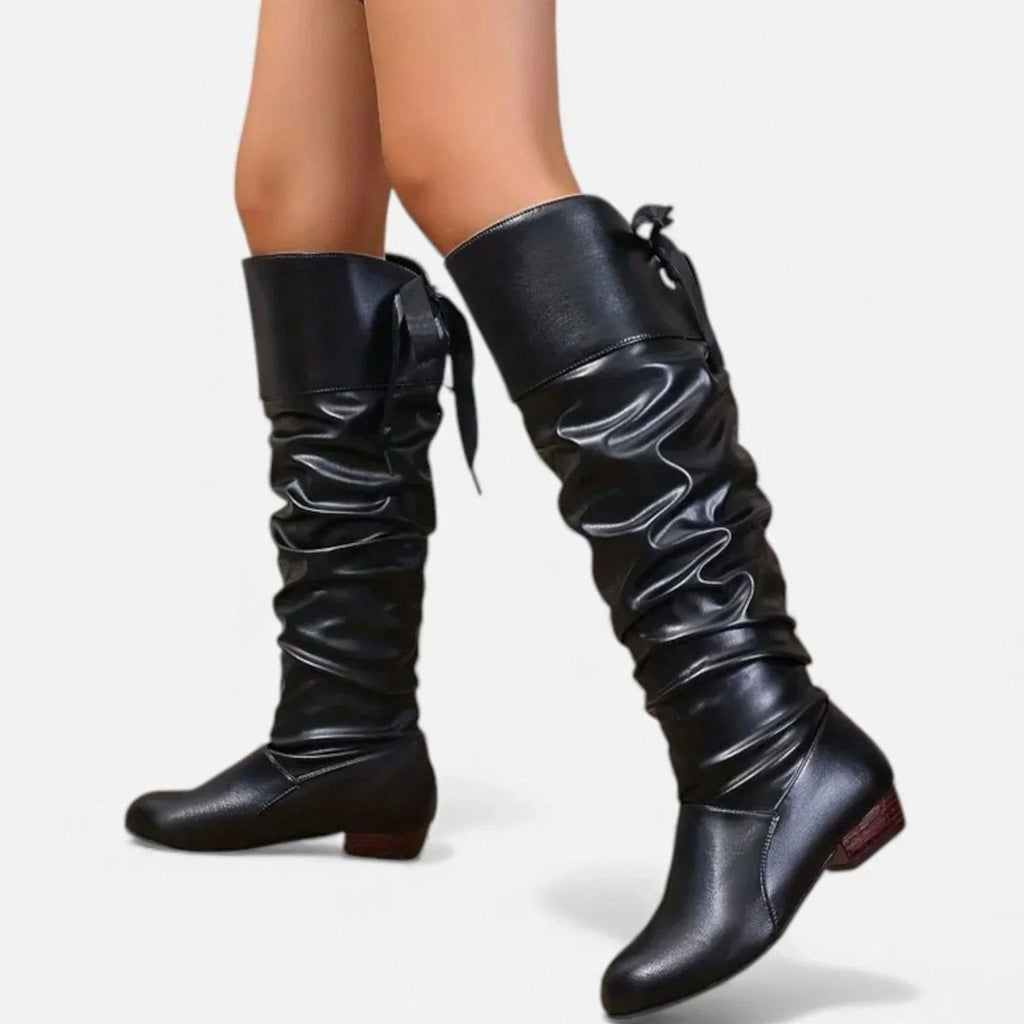 Botines con lazo y tacón bajo en distintos colores disponibles