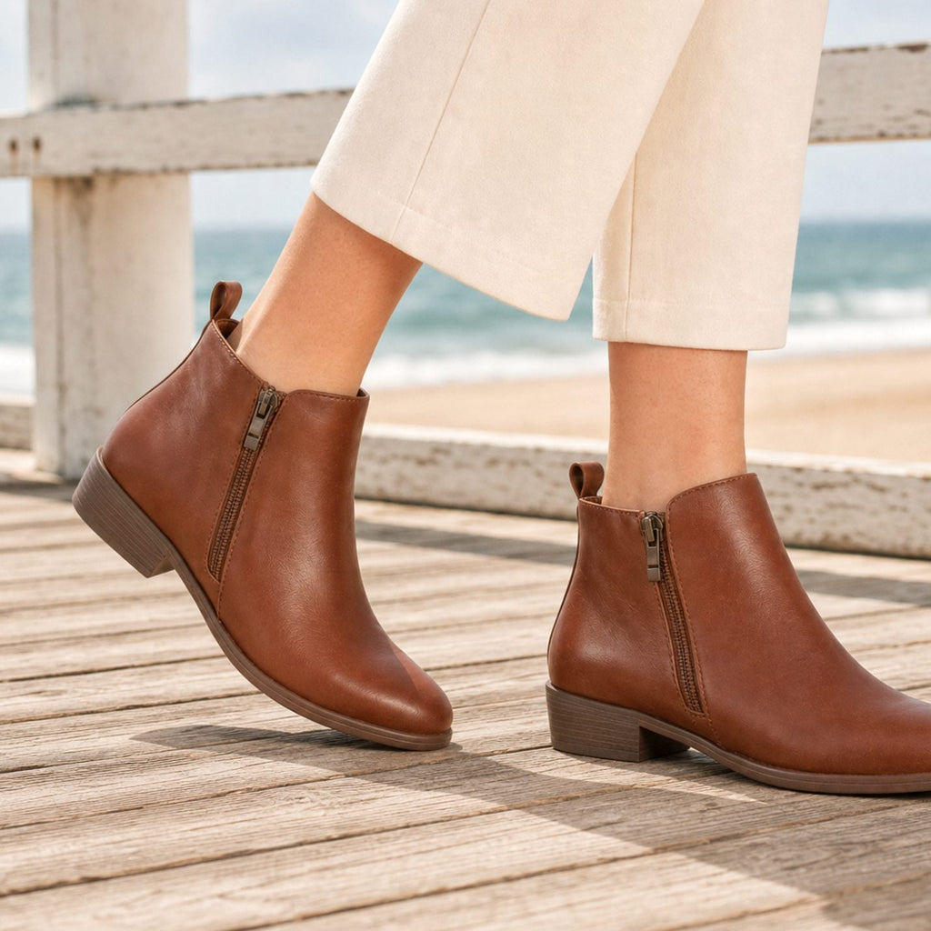Botines ortopédicos de mujer con cremallera lateral y tacón bajo, vista frontal